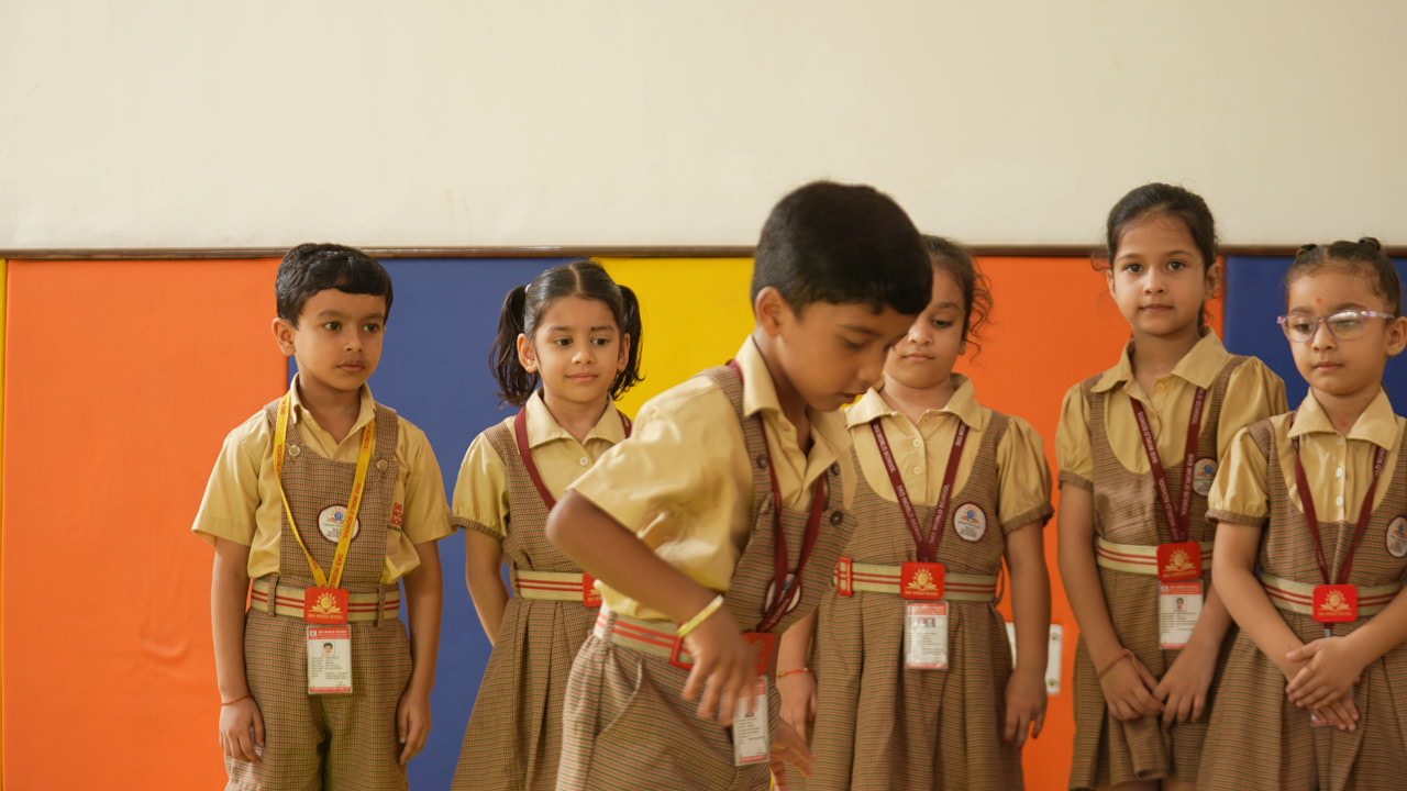 Primary students of SKS World School standing together in their uniforms